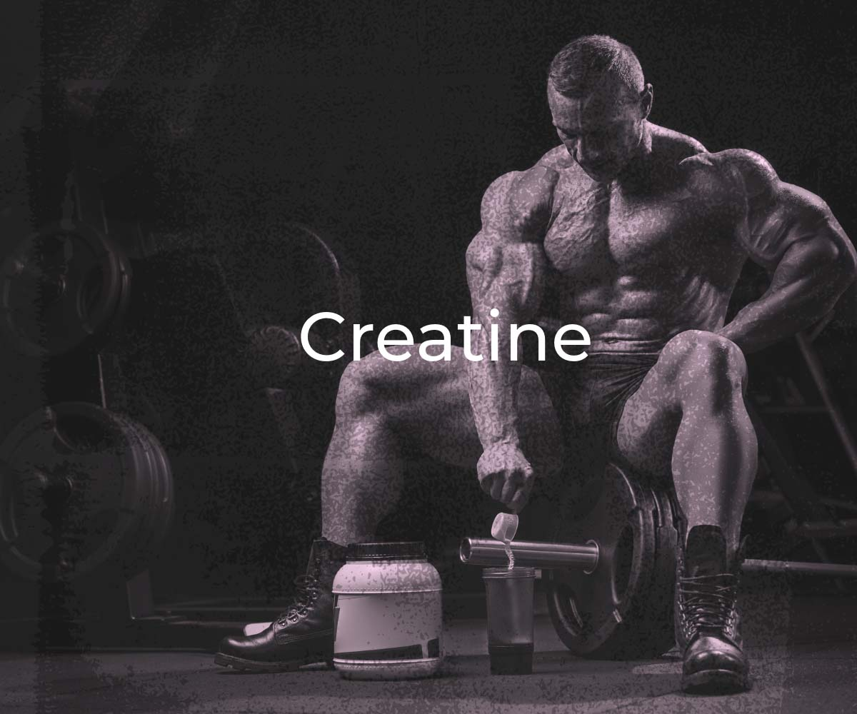 a man holding a single dumbbell with two creatine products at display